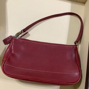 Red coach bag.